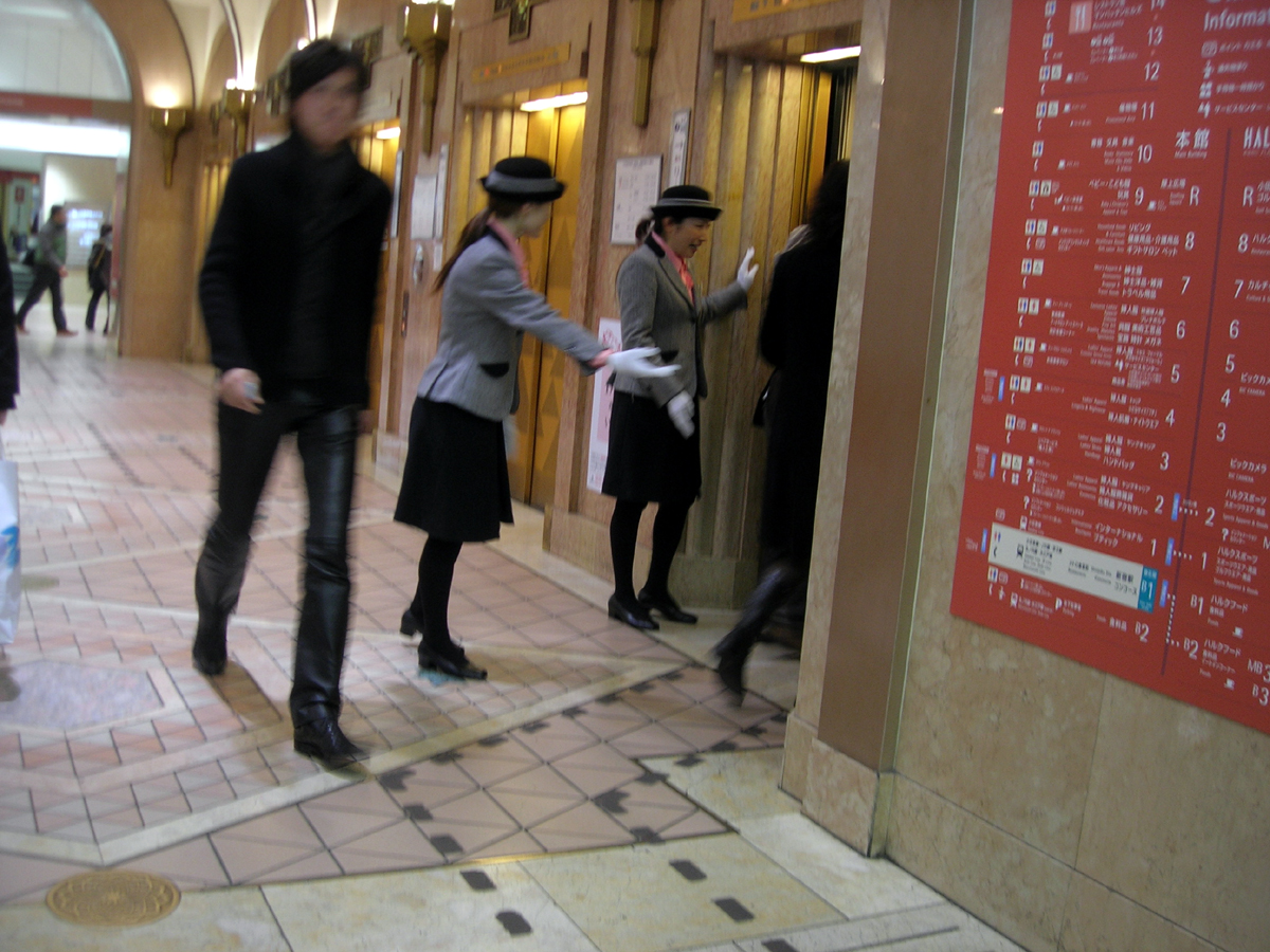 Elevator operator at work, illustrating a job transformed by automation